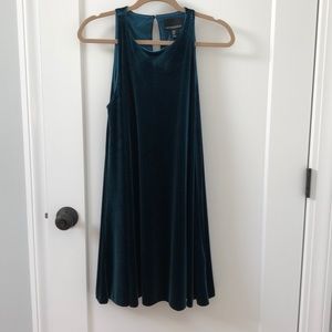 Emerald green velvet dress